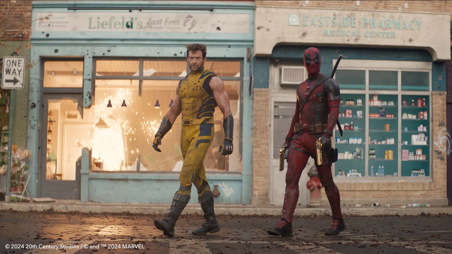 Wolverine and Deadpool walking side by side 