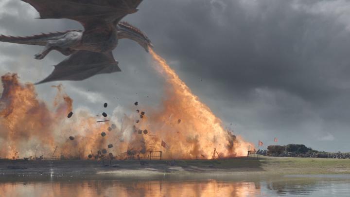 A scene from Game of Thrones that was created with the assistance of high quality playback, editing and review compositing software, Nuke Studio. Drogon is breathing fire at a burning village.