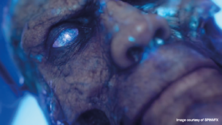 Man glowing blue eyes