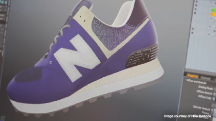 Blue shoe with white detail on computer
