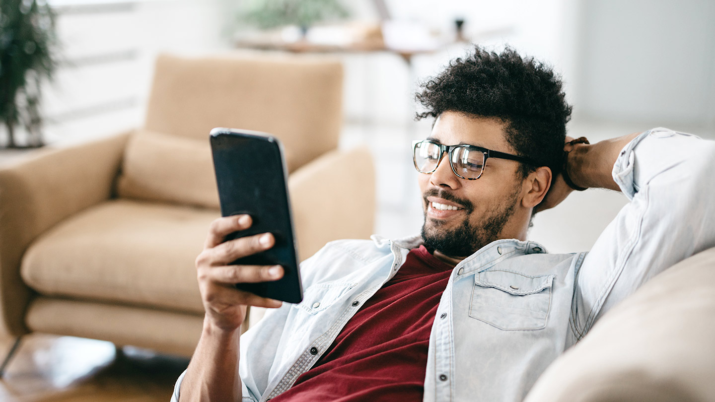 Man looking at the mobile phone
